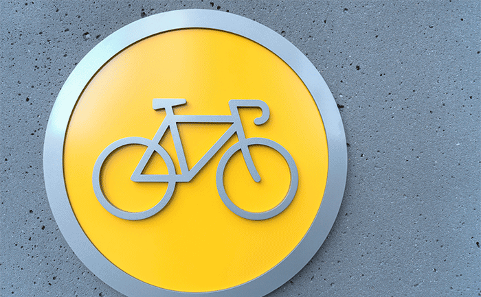 Icono amarillo con símbolo de una bicicleta.